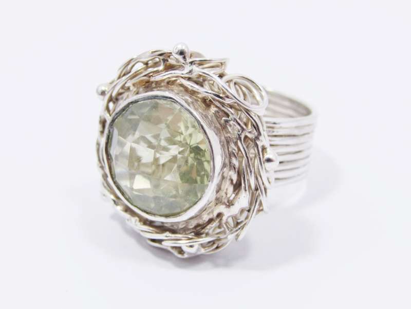 A Gorgeous  Light Green Quartz Nest Design Ring in Sterling Silver.