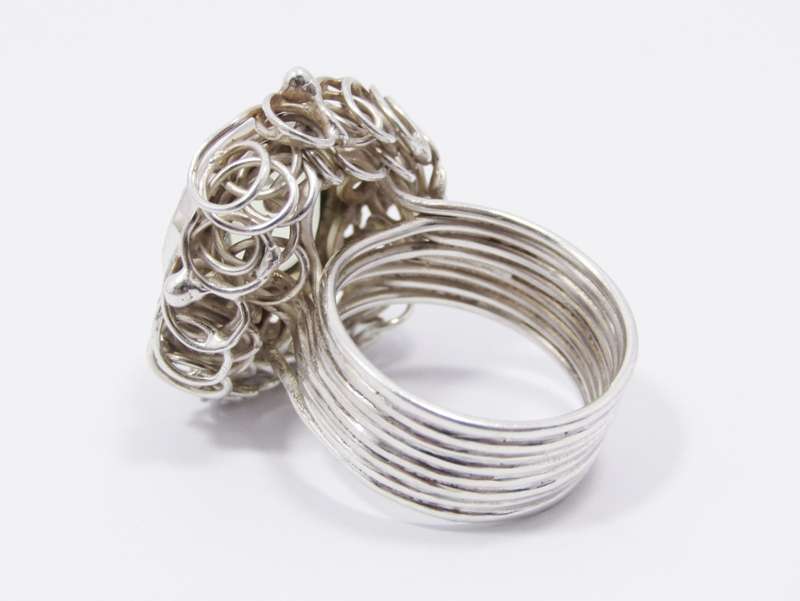 A Gorgeous  Light Green Quartz Nest Design Ring in Sterling Silver.