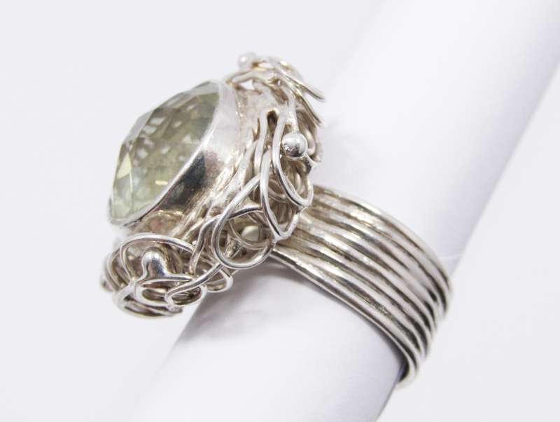 A Gorgeous  Light Green Quartz Nest Design Ring in Sterling Silver.