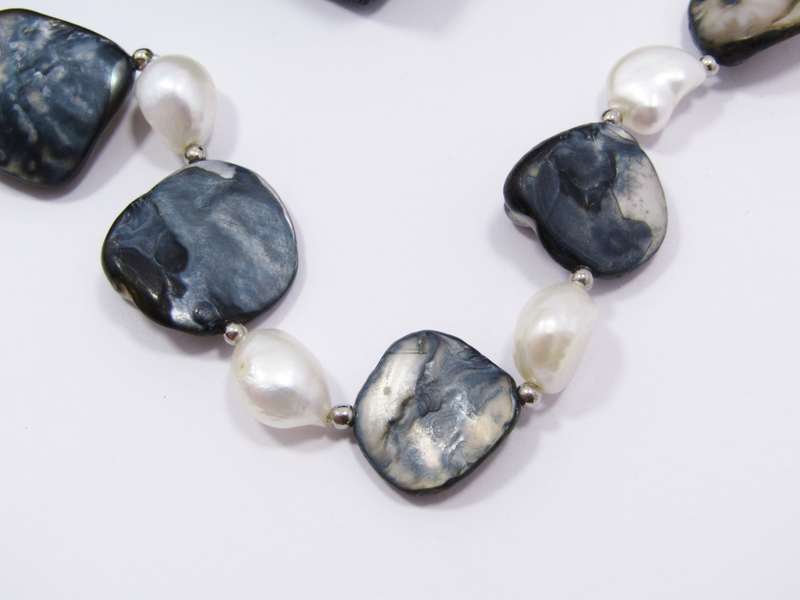 A Gorgeous Baroque Pearls And Mother of Pearl Necklace With a Sterling Silver Clasp