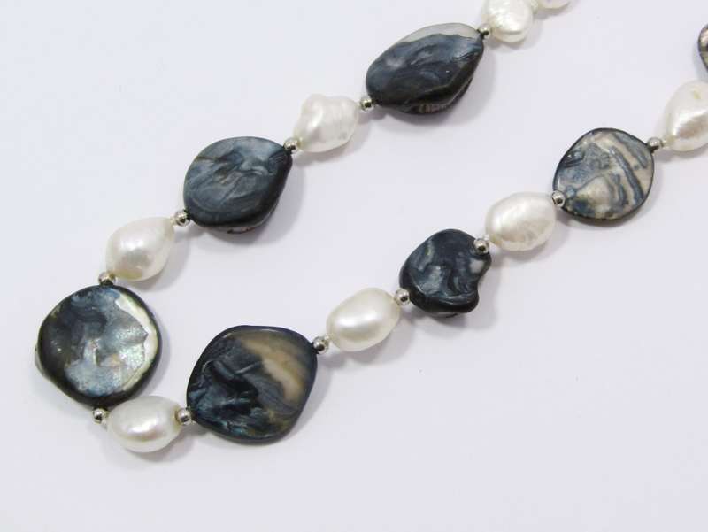 A Gorgeous Baroque Pearls And Mother of Pearl Necklace With a Sterling Silver Clasp