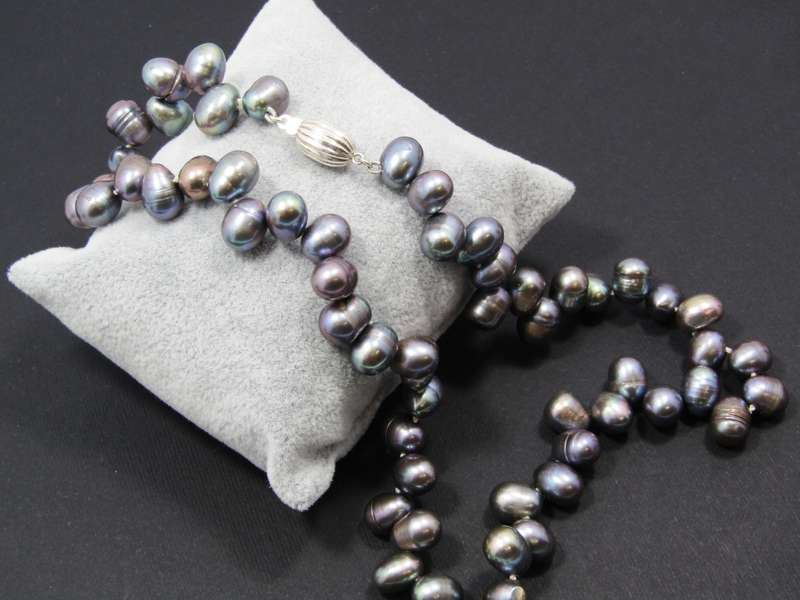 A Gorgeous String of Fresh Water Peacock Pearls With a Sterling Silver Clasp