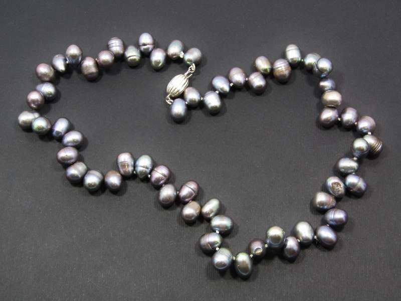 A Gorgeous String of Fresh Water Peacock Pearls With a Sterling Silver Clasp