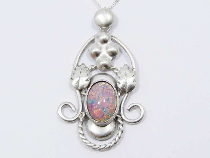 A Beautiful Vintage Design Art Glass Pendant On Chain in Sterling Silver.