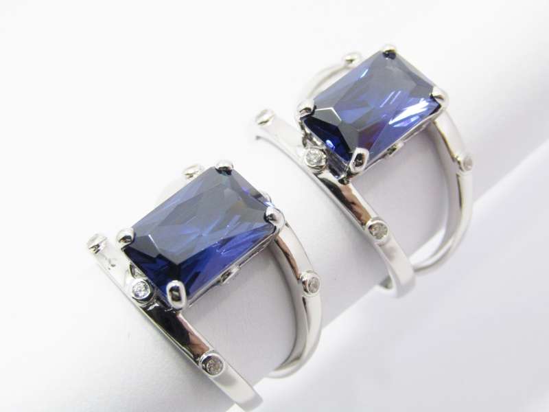 A Beautiful Double Row Into One Band Blue  Zirconia Ring in Sterling Silver.