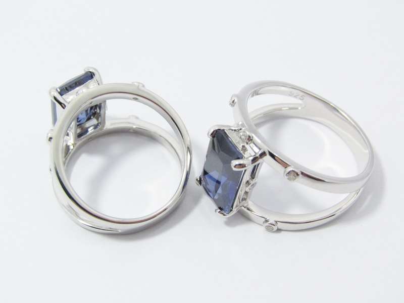 A Beautiful Double Row Into One Band Blue  Zirconia Ring in Sterling Silver.