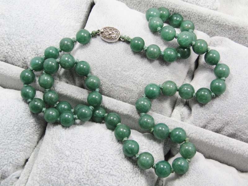 A Gorgeous String Of Adventurine Beads With a Oriental Vintage Clasp in Sterling Silver