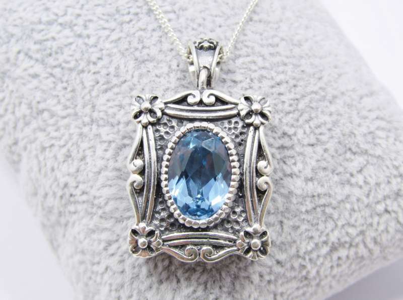 A Spectacular Blue Zirconia  Pendant On Chain in Sterling Silver.