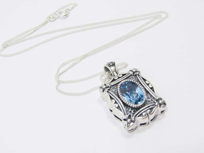 A Spectacular Blue Zirconia  Pendant On Chain in Sterling Silver.