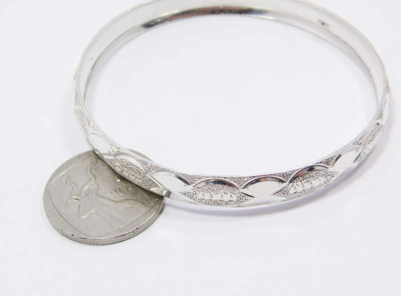 A Gorgeous Textured Bangle in Sterling Silver.
