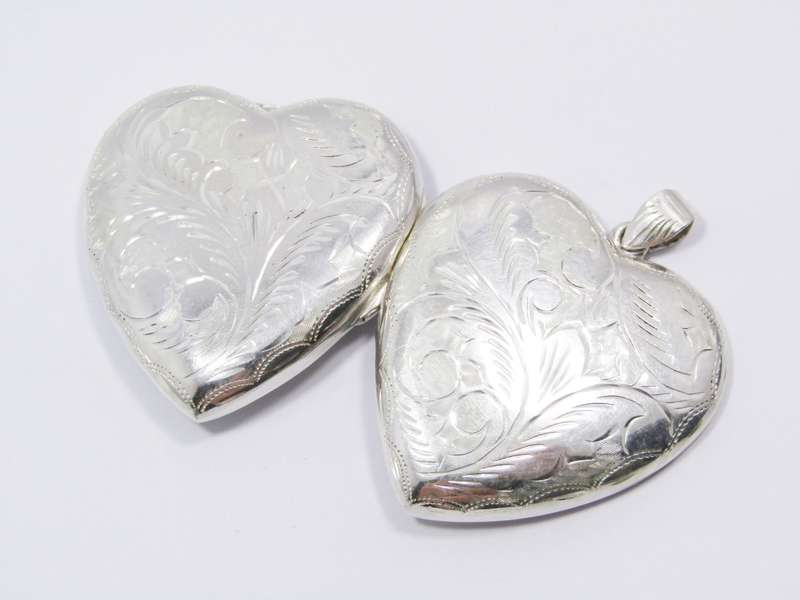 A Gorgeous Huge Vintage  Design Engraved Locket in Sterling Silver