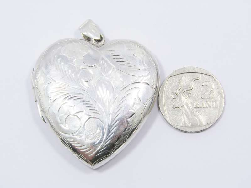 A Gorgeous Huge Vintage  Design Engraved Locket in Sterling Silver