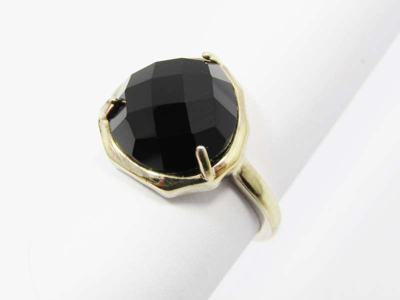 A beautiful Gold Gilt Over Sterling Silver Facetted Onyx Ring