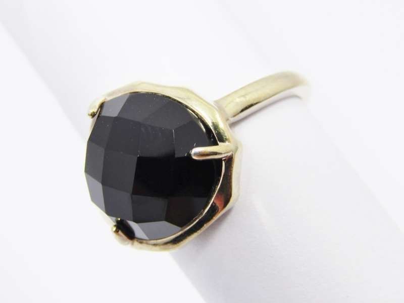 A beautiful Gold Gilt Over Sterling Silver Facetted Onyx Ring