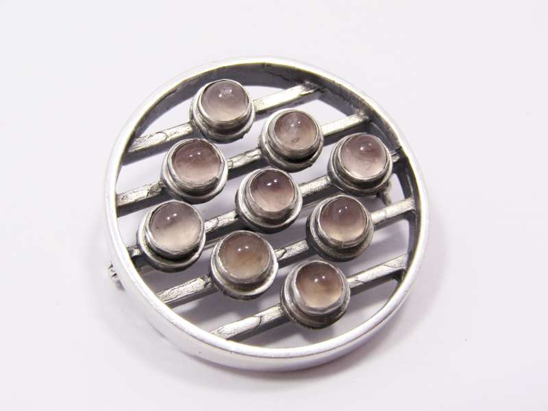 A Stunning Modernist Style Brooch With Rose Quartz stones in Silver.