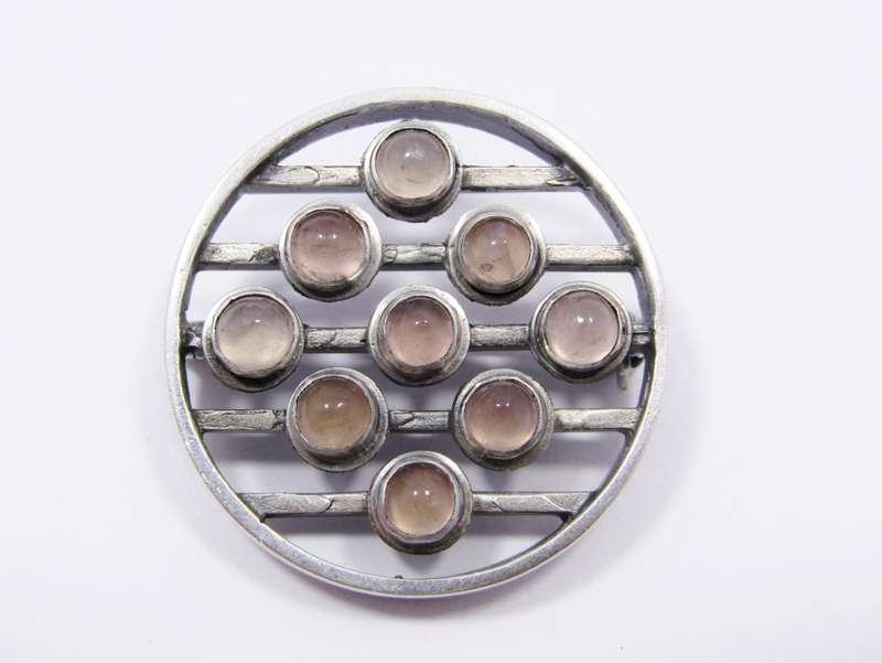 A Stunning Modernist Style Brooch With Rose Quartz stones in Silver.
