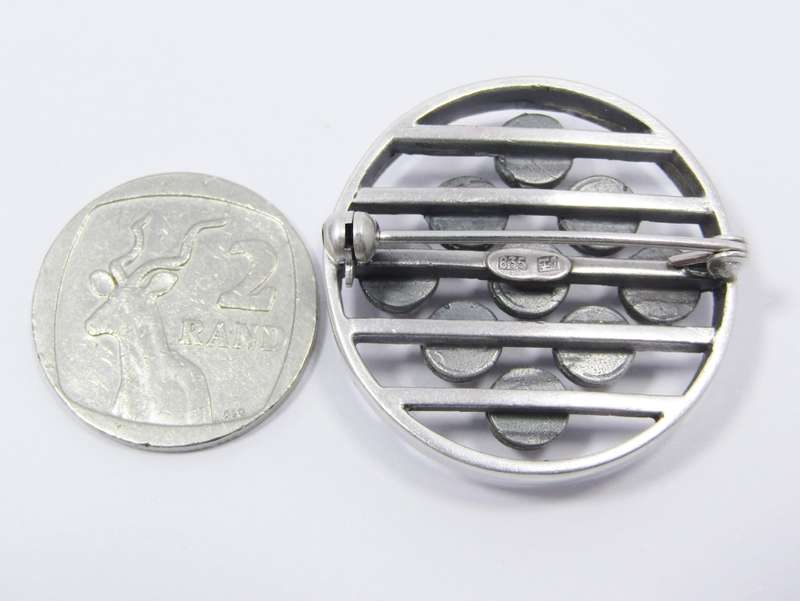 A Stunning Modernist Style Brooch With Rose Quartz stones in Silver.