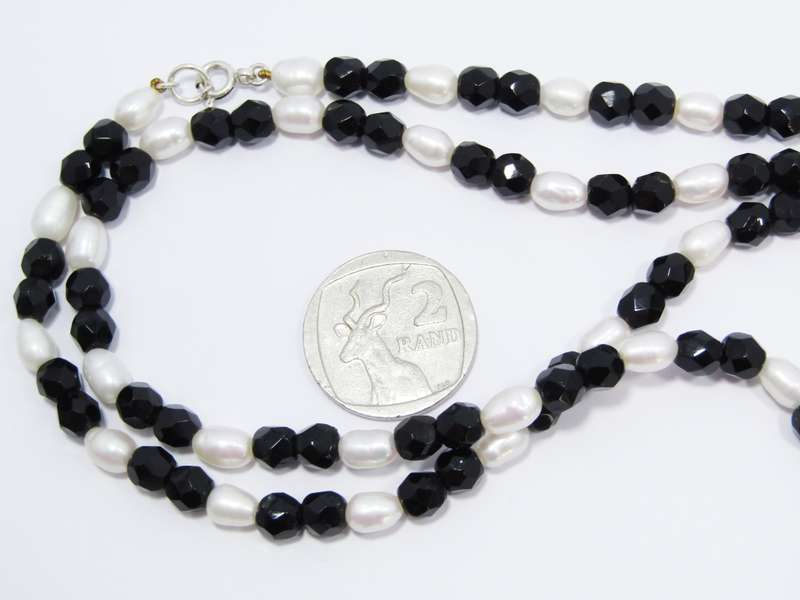 A Freshwater Pearls and Black Jet Beads With a Sterling Silver Clasp