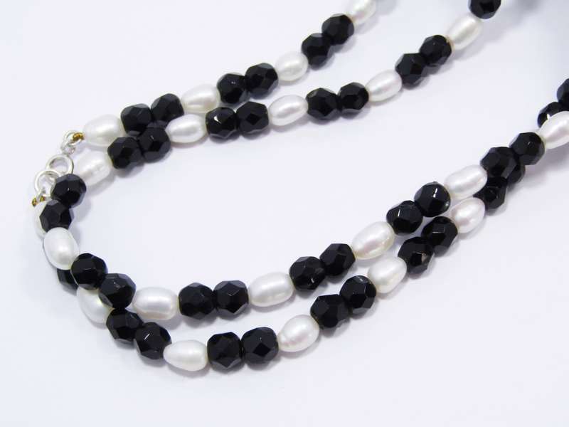 A Freshwater Pearls and Black Jet Beads With a Sterling Silver Clasp