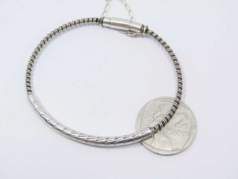 A Stunning Wire Design Bangle With a Magnetic Clasp in Sterling Silver