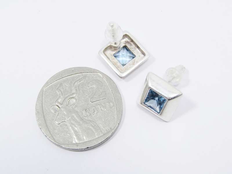 A Gorgeous Pair of Square Blue Zirconia Earrings in Sterling Silver.