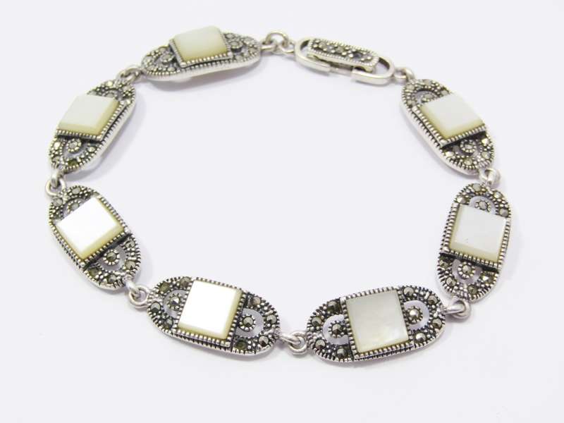 A Lovely Mother of Pearl and Marcasite Bracelet in Sterling Silver.