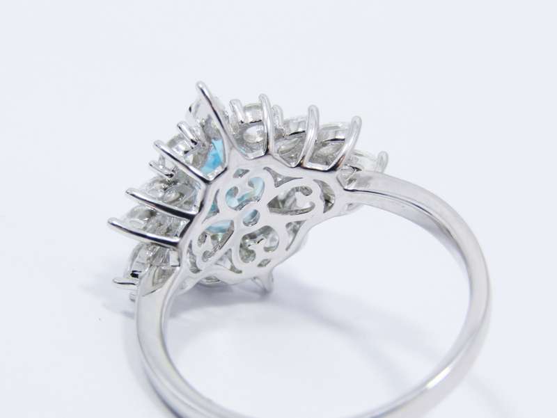 A Gorgeous Sea Green Zirconia Cluster Ring in Sterling Silver.