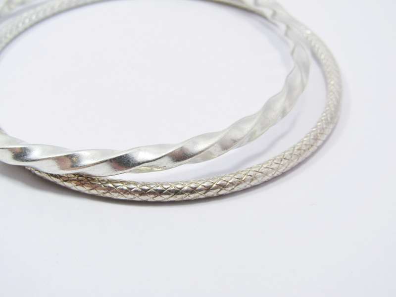 Two Lovely Textured  Stack Bangles in Sterling Silver.