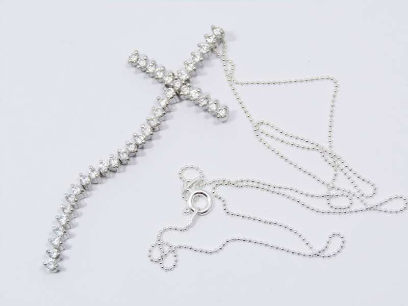 A Beautiful Long Zirconia Cross On Chain in Sterling Silver.