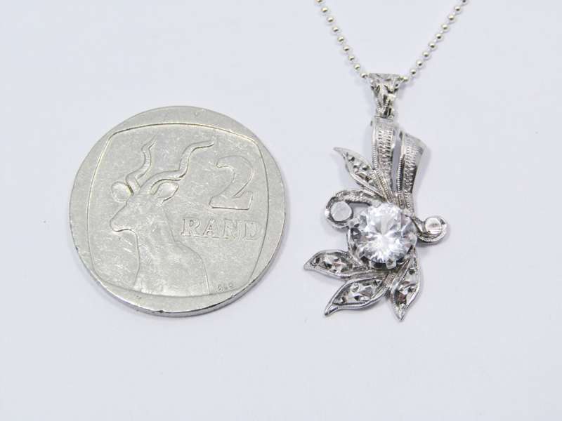 A Very Pretty Vintage Design Pendant With a Clear Paste Stone on Chain in Sterling Silver.