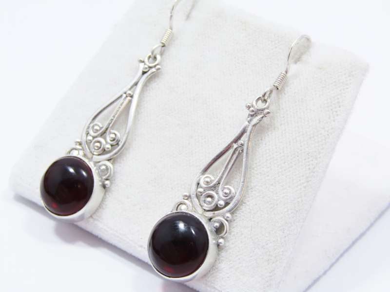 A Lovely Pair of Vintage Design Dangling Earrings With a Red Stone in Sterling Silver.