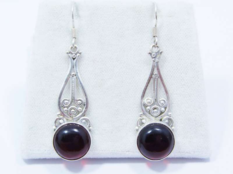 A Lovely Pair of Vintage Design Dangling Earrings With a Red Stone in Sterling Silver.