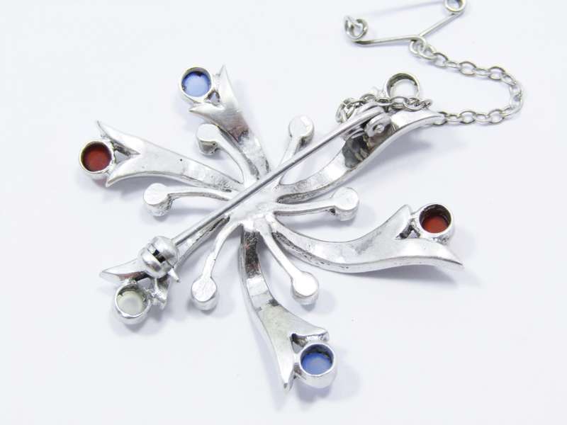 A Beautiful Multi Color Stone Brooch With Marcasite's in Sterling Silver.