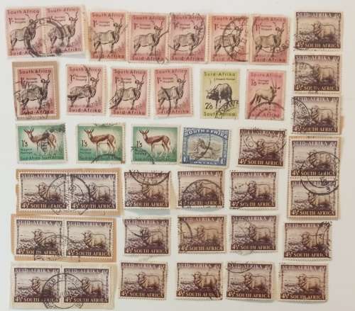 box of +/- 300 early South African stamps