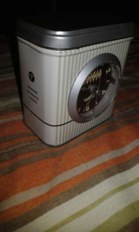 Collectible FOSSIL Tin Clock (working)