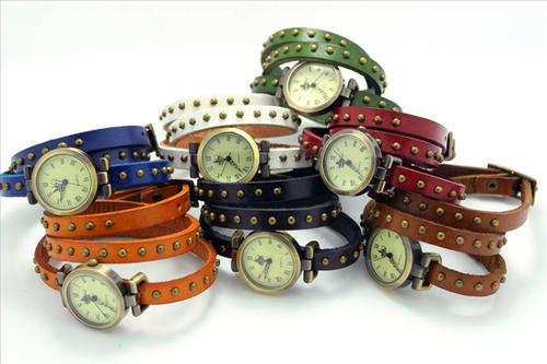 HIGH QUALITY WRAP AROUND LADIES LEATHER WATCH WITH METAL BUTTONS COLOUR IS BLUE