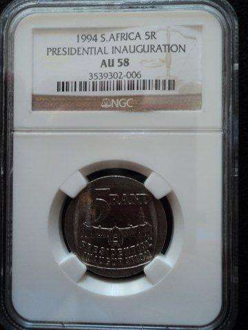 1994 Presidential Inauguration R5 .  AU58 NGC Graded Coin. Building in front.