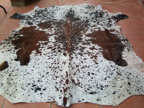 TANNED NGUNI HIDE -RED / BROWN / WHITE (NR 23)