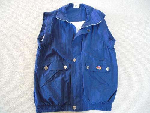 SLEEVELESS JACKET - BODY WARMER