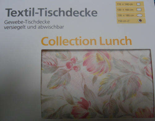ROUND PLASTIC TABLECLOTH -  FABRIC BACKED - in original packaging