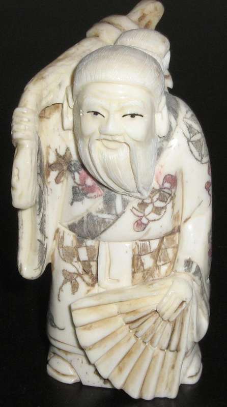 CHINESE BONE CARVING OF AN IMMORTAL