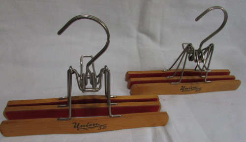 2 Wooden Trouser Hangers holding 2 pairs of Trousers