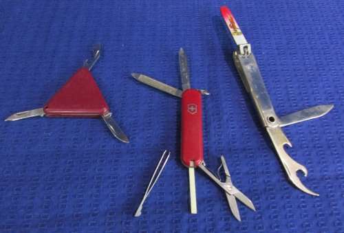 3 POCKET KNIVES including a Swiss Army Knife