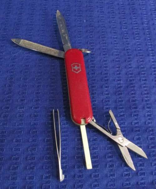 3 POCKET KNIVES including a Swiss Army Knife