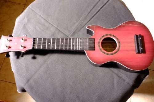 Vintage `Happy Tune` Ukulele