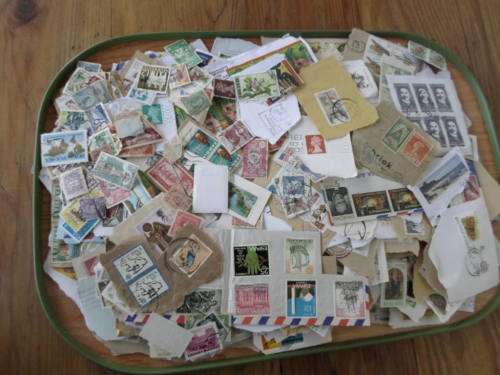 1000 X WORLD USED STAMPS ON PAPER SEE PICS!!!