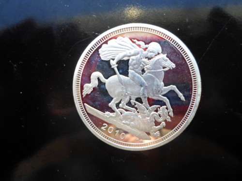 QUEEN ELIZABETH  2010 SILVER PLATED UNCIRCULATED COIN IN PLASTIC SLEEVE SEE PICS!!!