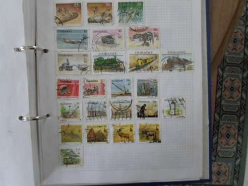 LARGE FILE WORLD STAMPS NEAT LOT NOT ALL PAGES SCANNED SEE PICS