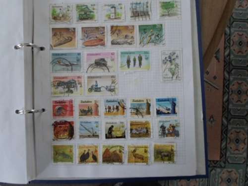 LARGE FILE WORLD STAMPS NEAT LOT NOT ALL PAGES SCANNED SEE PICS