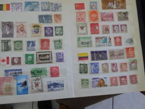 ALBUM MIXED WORLD MINT AND USED STAMPS SOME GOOD VALUES HERE SEE PICS